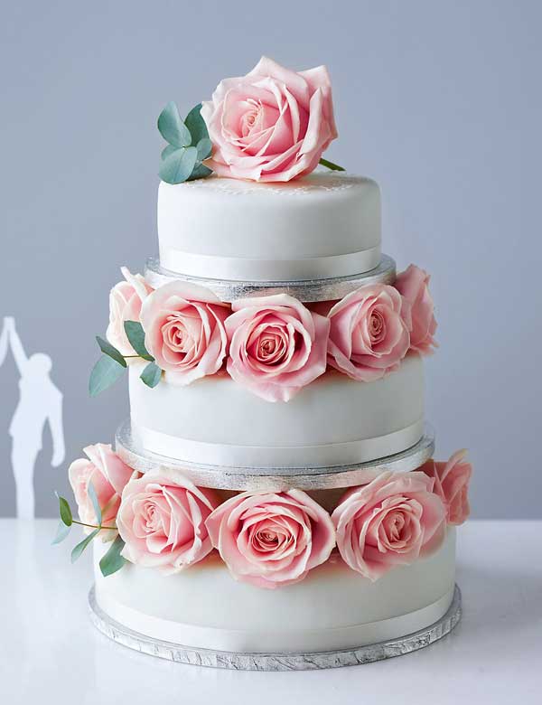 A wedding cake with roses